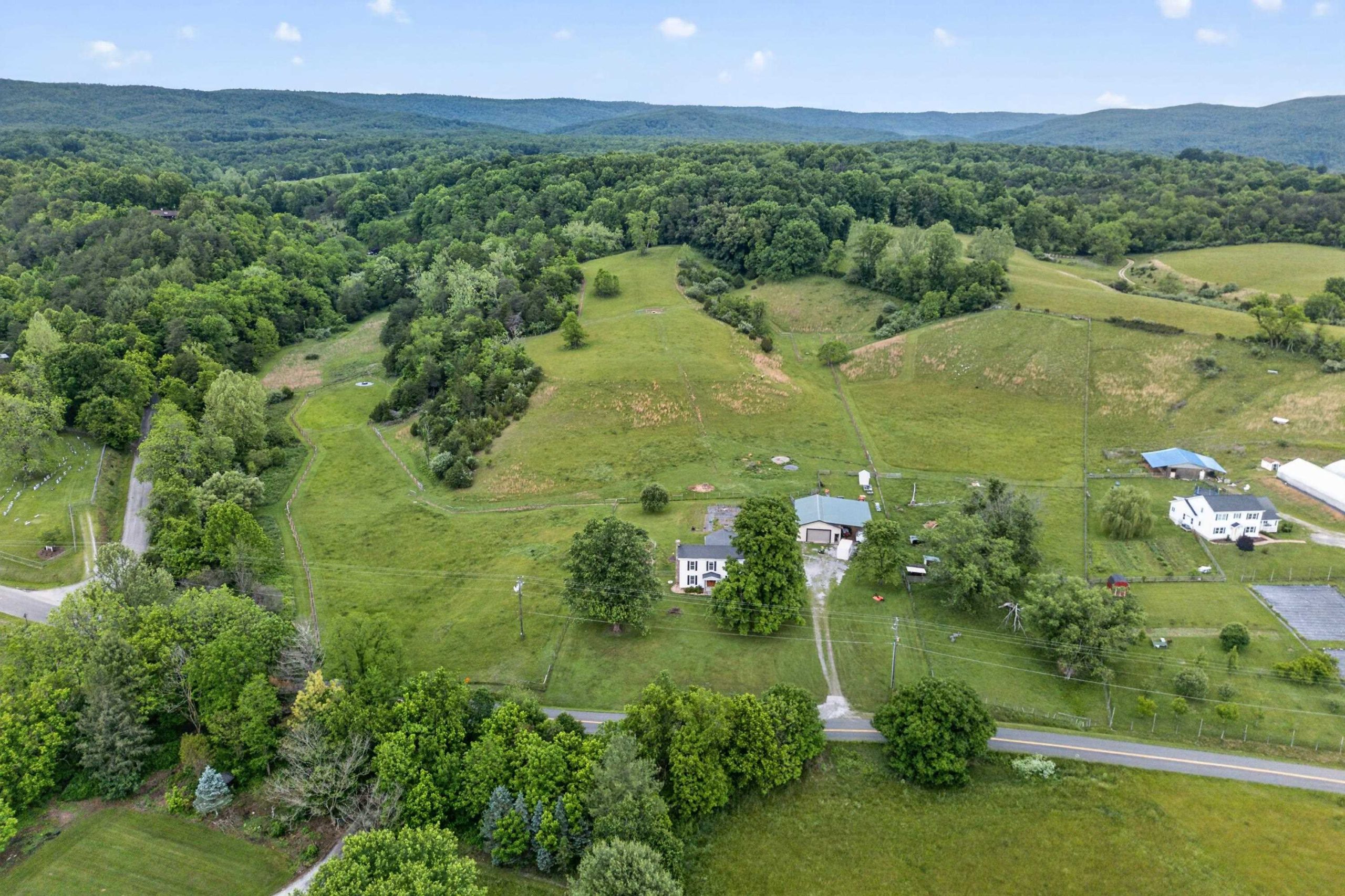 Drone image of a sloping 26 acre field.